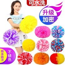 61 Childrens cheerleaders with hand flowers for dancing Cheerleaders with hand flowers for a pair of kindergarten dances