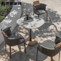 Simple outdoor solid wood table and chair combination outdoor villa garden leisure rattan chair balcony three-piece hotel furniture