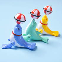 Wind-up clockwork toy small animal Sea lion top ball Wind-up running rotating dolphin top ball toy Sea Lion children