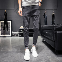 Jeans mens 2020 autumn new thin Korean version of the trend slim small feet stretch casual black mens trousers