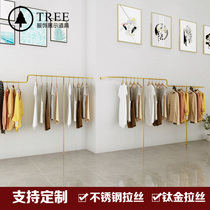 Clothing store display stand on the wall stainless steel against the wall floor frame womens side hanging titanium wire drawing custom display rack shelf
