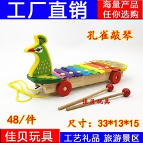 Peacock accordion childrens educational Peacock knocking piano toy toddler duck trailer wooden toy Peacock piano