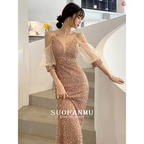 Evening dress summer women 2021 new light luxury niche high-end banquet temperament gold suspender sequined fishtail long skirt