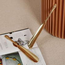 Retro European-style imported brass shoehorn Retro light luxury home golden long handmade shoes pumping shoes household