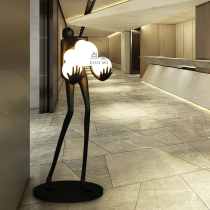 Nordic post-modern human body sculpture atmospheric living room creative holding ball model room hotel sales department Minimalist floor lamp