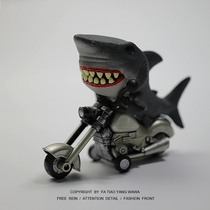 The clockwork is boring the big shark toy that plays with the Moto.