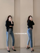 Jiaoyang celindasolor 丨 Chopstick legs personality fashionable asymmetrical contrast color narrow leg nine-point jeans