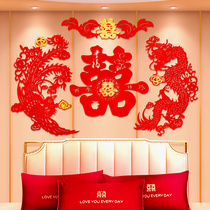 Wedding room decorated with big red velvet bronfengxi bedside background wall arranged wedding products with ceremonial papers