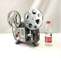 Old-fashioned antique silent Swiss Baolax Bolex bread 18-5 8mm movie projector functions normally