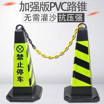 No parking warning signs at the door. Private occupation of parking spaces