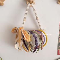 Nordic hanging creative hand woven roll paper storage rack Hair accessories storage artifact diy material bag
