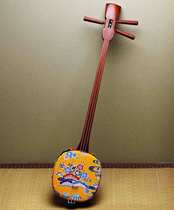 Japanese shamisen traditional orange printed three-stringed instrument Okinawa Ryukyu exquisite production