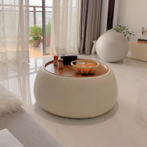 Designer italian high end round tea table Nordic minimalist light extravagant living-room cortex storage solid wood edge a few