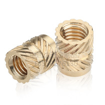 Injection molding hot melt copper nut M3 embedded copper inlaid parts Hot and cold pressed round roller oblique flower through-hole nut m3 earth word spot