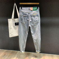 Mens pants spring and autumn high-end light color hole jeans mens Tide brand slim feet 2021 new long pants men