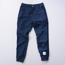 Thombrowne new stitching dark bar nylon cotton trousers men and women Tibetan sports pants elastic sweat absorption Joker
