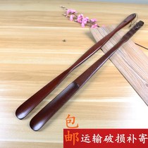 Dark solid wood shoe pull household long handle elderly pregnant women do not bend over shoehorn shoehorn wooden shoehorn shoe pull 75