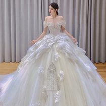 One-word shoulder main wedding dress 2021 new temperament summer princess style high-end big tail luxury heavy industry super fairy high-end
