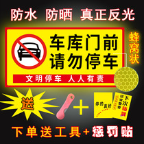 There are cars in front of the garage No parking warning signs Do not park private cars Garage reflective stickers