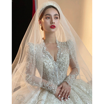 Long-sleeved main wedding dress 2021 new temperament bride summer small V-neck heavy industry luxury court style big tail