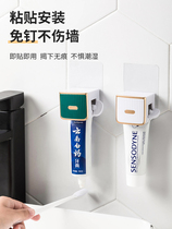 Squeeze toothpaste artifact household wall-mounted rack childrens toothbrush rack non-punching clip head sample squeezer