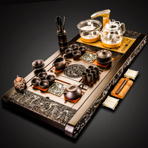 The whole set of Kung Fu tea set Solid wood tea tray Ebony four-in-one ceramic teacup Purple sand tea table tea sea