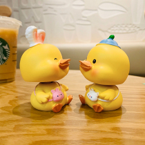Creative cute net red little yellow duck shaking his head desktop decoration Birthday gift car interior decoration office decoration decoration