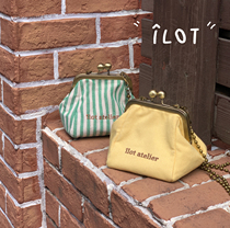 ILOT | çaira The niche original ins milk yellow-green striped mouth gold bag