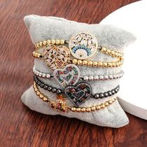 European and American hip-hop copper micro-inlaid color zircon love heart-shaped couple bracelet female hand rope student supply black rope hand jewelry