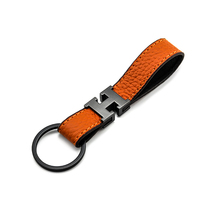 Light luxury high-end H-word fashion exquisite head layer cowhide hair leather car keychain pendant men and women couples