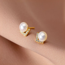 Natural pearl earrings female 2021 New Tide temperament senior sense light luxury silver earrings exquisite small earrings