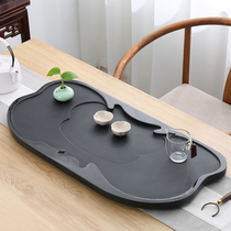 Ujinshi tea tray Whole piece of household living room simple natural stone tea table drainage stone tea ceremony tea set black gold stone