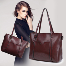 European station Hand bag female 2021 New Fashion simple shoulder shoulder bag large capacity Joker leather hand bag