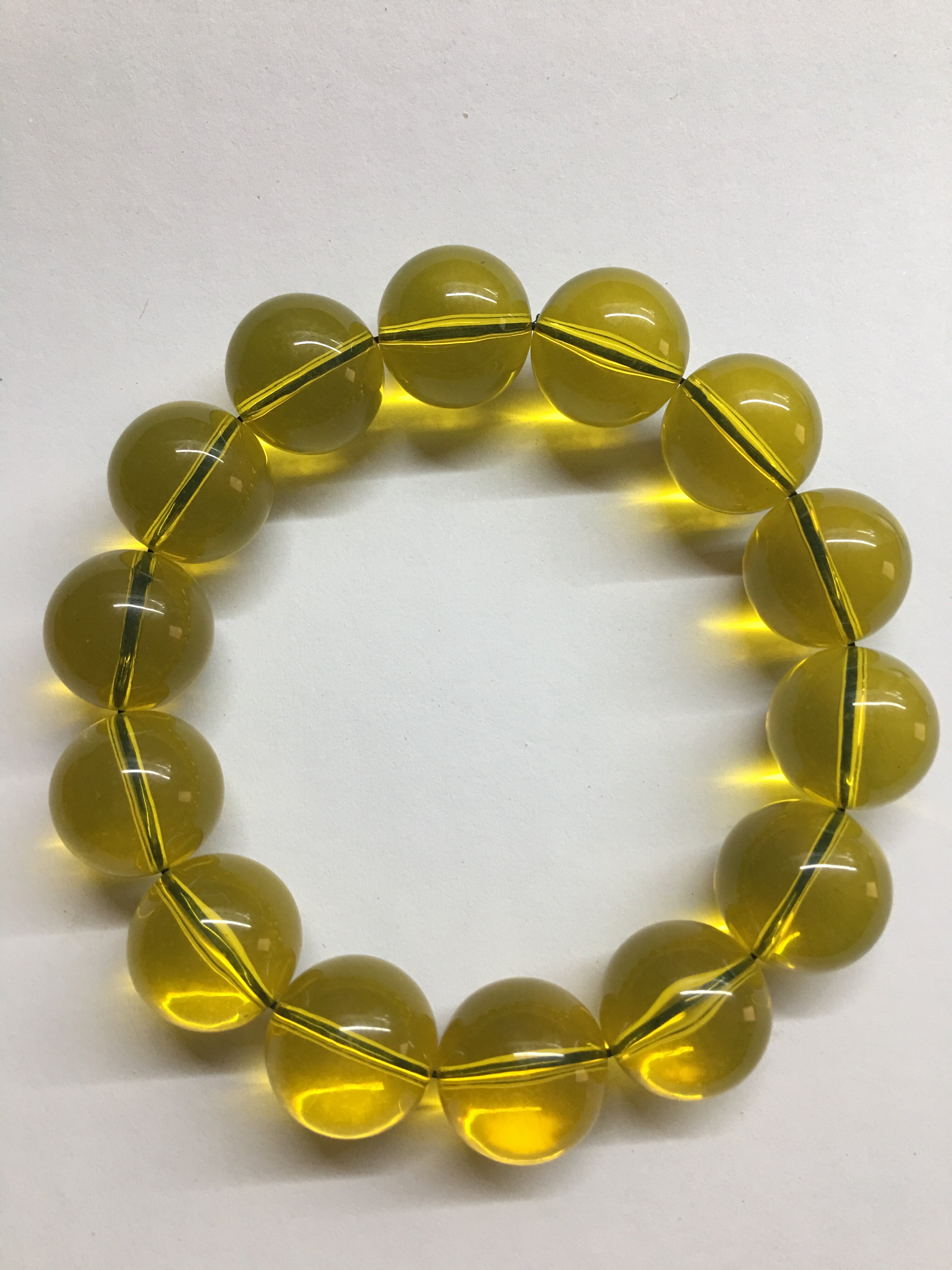 Amber beaded blue string diameter 1.6 cm