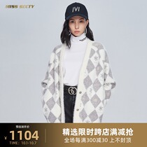 Miss Sixty long loose slouchy style outside wearing cardigan coat snowflake sweater women