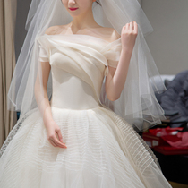 New wrinkled one-shoulder forest wedding dress fairy simple Korean light luxury satin travel photo welcome autumn satin