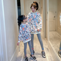 High-end pro-child clothing family of three-mouth 2022 new Korean version Mother woman trendy ocean gas spring and autumn blouses child clothing wave