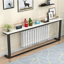 The sofa rear shelf radiator is narrow against the wall. The upper shelf above the floor covers the gap of the living room partition.