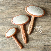 Mu Si falls in love with long-haired cats and dogs in the French school. Pets with round-headed needle combs. Daily care of hairs open knots and fluffy combs