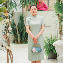 Xia Xi mother-in-law banquet mother-in-law wedding dress light green three-point sleeve modified side eight-button double-layer medium-long elegant cheongsam
