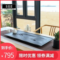 Master Zhixintang handmade whole piece of natural black gold stone tea tray Stone head tea table Household dry-brewed Kung Fu tea set