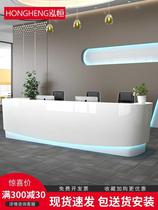 Simple and modern company front desk reception desk shaped white paint desk Creative cashier bar desk
