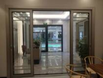 The 3-track sliding door in Warsaw (with gold steel mesh) in the Warsaw