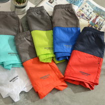  Summer beach pants swimming trunks color-matching sports shorts running fitness mens training three-point quick-drying pants tide