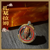 Zakiram rubs the Buddha pendant