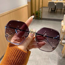 In 2022 the new frame cut round sunglasses temperament sunglasses female face with lean glasses anti ultraviolet light