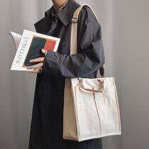 KAFKAsSHOP skew satchel black-and-white canvas handbag male and female street pat on large capacity single shoulder personality Postbag tide